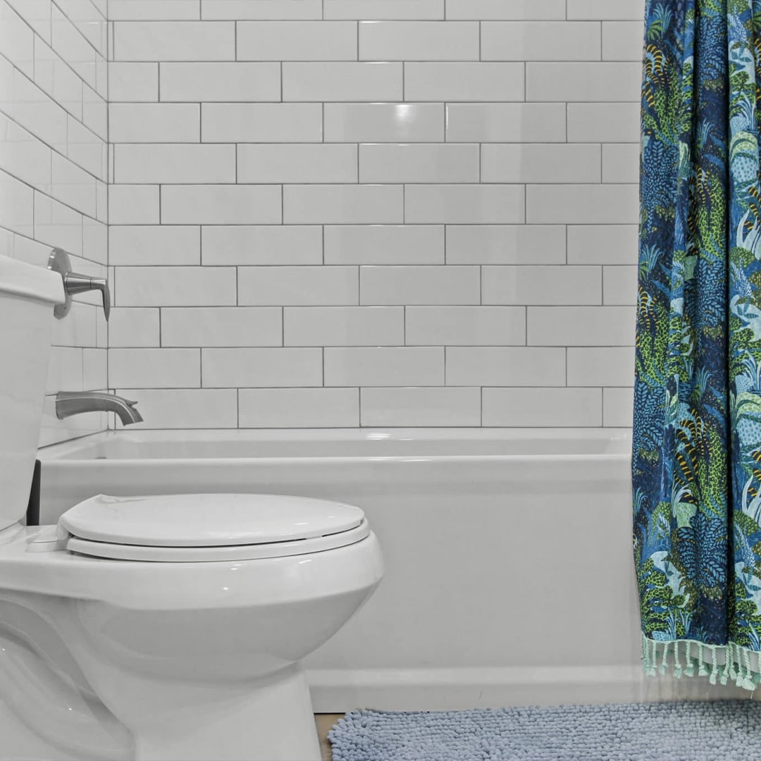 White tiled remodeled bathroom in WI